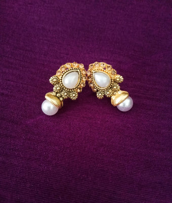 E0726_Lovely pearl studs with delicate craft work with a touch of stones.