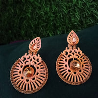 E0729_Classy crafted earrings with delicate work studded with sparkling golden stones.