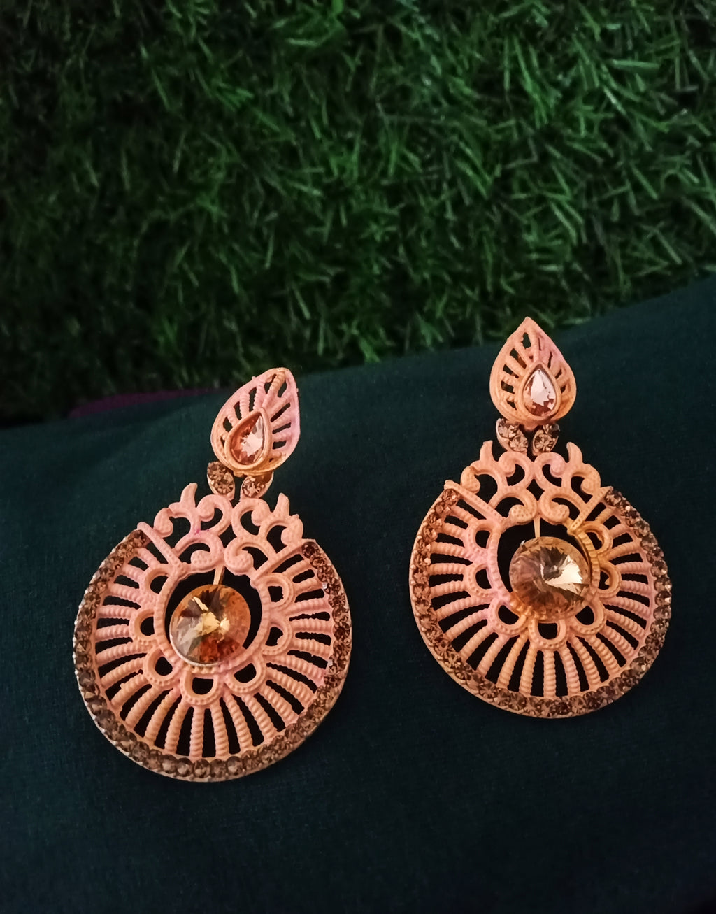 E0729_Classy crafted earrings with delicate work studded with sparkling golden stones.
