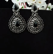 E0738_Gorgeous german silver oxidized earrings with delicate patterns with a touch of black stones.