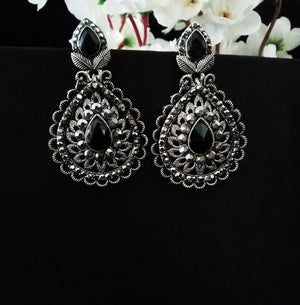 E0738_Gorgeous german silver oxidized earrings with delicate patterns with a touch of black stones.