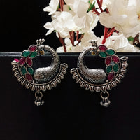 E0746_Trendy crafted german silver oxidized peacock design earrings with delicate work studded with pink and green stones with a touch of beads.