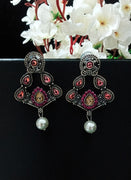 E0750_Gorgeous german silver oxidized earrings with a touch of dazzling vibrant stones with a touch of pearls.
