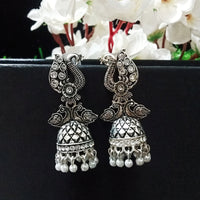 E0751_Lovely german silver oxidized peacock design jumkas with a touch of dazzling stones with a touch of pearls.
