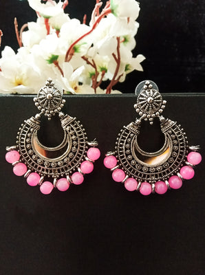 E0779_Lovely crafted circular shaped earrings with delicate patterns with a touch of vibrant pink beads studded with a mirror.