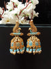 E0781_Lovely peacock design jumkas with delicate art work with a touch of vibrant bead drops studded with dazzling stones.