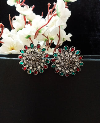 E0784_Classy oxidized flower design studs with delicate art work with a touch of dazzling stones.