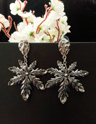 E0793_Trendy crafted leafy design danglers with delicate work.