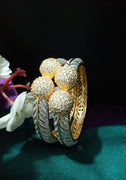 B0184_Classy style bangles studded with american diamond stones with delicate craft work.