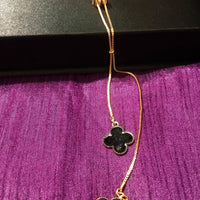 N0270_Elegant trendy long necklace with a touch of sparkling stones flower shaped pendant.