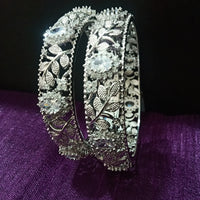 B0185_Gorgeous bangles with delicate stone work embellished with American Diamond stones.