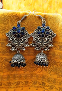 E0761_Classic crafted German silver oxidized danglers with a jumka drop along with a touch of stones and bead drops studded with blue stones.