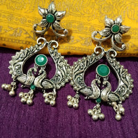 E0772_ Classy crafted peacock pattern German silver oxidized danglers with a touch of stones along with bead drops.