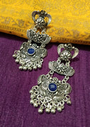 E0774_ Classy crafted German silver oxidized danglers with a touch of delicate art work studded with stones.