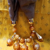 P048_Beautiful brown shade soft pendant scarf with a touch of beautiful orange bead work .