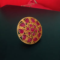 R027_Gorgeous circular shaped golden color rings with a touch of semi precious pink ruby  stones.
