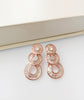 E0538_Premium Rose gold disc shaped American Diamond  Earrings.
