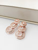 E0538_Premium Rose gold disc shaped American Diamond  Earrings.