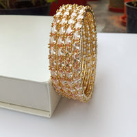 B0162_Gorgeous Golden crafted bangles with a touch of  American Diamond stones.