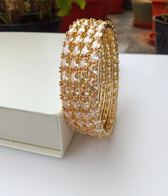 B0162_Gorgeous Golden crafted bangles with a touch of  American Diamond stones.