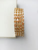 B0162_Gorgeous Golden crafted bangles with a touch of  American Diamond stones.