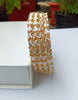 B0162_Gorgeous Golden crafted bangles with a touch of  American Diamond stones.