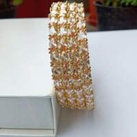 B0162_Gorgeous Golden crafted bangles with a touch of  American Diamond stones.