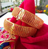 B0189_S_Gorgeous Gold plated screw type adjustable bangles with delicate craft work.