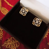 E0797_Premium American Diamond studs with delicate stone work.