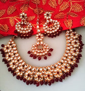 N0219_Classic Elaborated choker necklace set studded with white and maroon Kundan stones with a touch of glossy maroon beads.