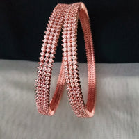 B0197_S_Elegant sleek rose gold bangles engraved with American Diamond stones with delicate stone work.