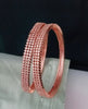 B0197_S_Elegant sleek rose gold bangles engraved with American Diamond stones with delicate stone work.