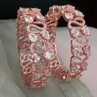B0196_S_Beguiling broad rose gold designer bangles engraved with American Diamond stones.