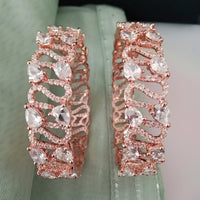 B0196_S_Beguiling broad rose gold designer bangles engraved with American Diamond stones.
