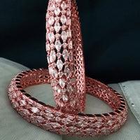 B0198_S_Gorgeous rose gold bangles embellished with American Diamond stones with delicate stone work.