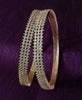 B0197_S_Elegant sleek rose gold bangles engraved with American Diamond stones with delicate stone work.