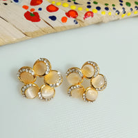 E0810_Lovely flower design studs with a touch of beads and dazzling stones.