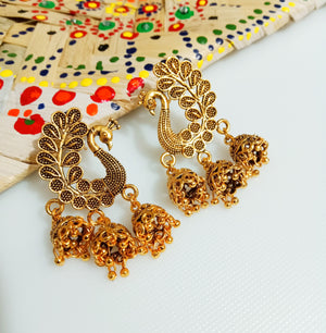 E0732_Gorgeous german silver oxidized peacock design jumka danglers with a touch of bead drops.
