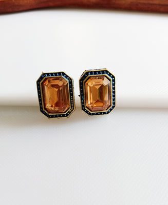 E0825_Elegant square shaped studs with a touch of bright stones.