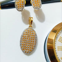 N080_Elegant Gold & Silver plated dual tone necklace set with earrings and ring studded with American Diamond stones.