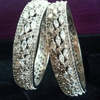 B0158_Elegant design silver crafted bangle studded with American Diamond stones.