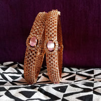 B038_Classy Style Rose Gold bangle studded with American Diamond stones with a touch of emerald.