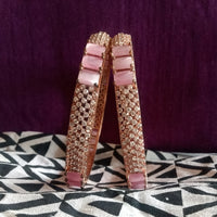 B046_ Classy Rose Gold plated bangles studded with  American Diamond stones.