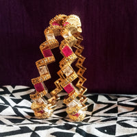 B019_Gorgeous Gold plated Bangles studded with white and pink ruby stones set of 2