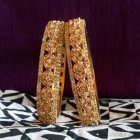 B065_Gorgeous Gold plated bangles  studded with  American Diamond  stones.