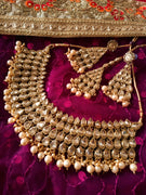 N0299_Classic Elaborated choker necklace set studded with white Kundan stones with a touch of pearls.