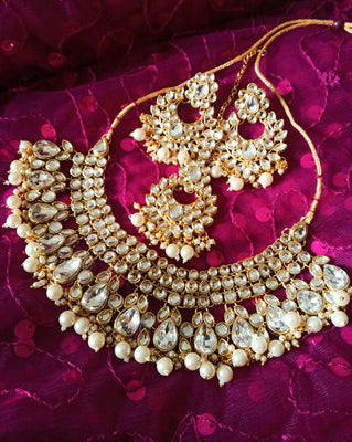 N0301_Beautiful elaborated choker necklace set studded with white Kundan stones with a touch of pearl drops.