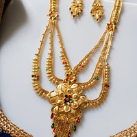 N0176_Ravishing traditional style Gold plated long layered grand necklace set with fine artwork of floral designs studded with pink and green ruby stones with a touch of broad chain drop pendant.