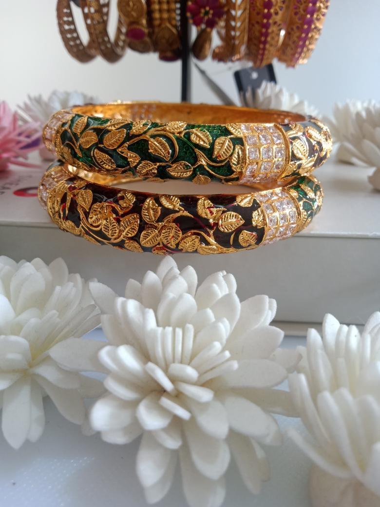B042_Gorgeous Bangles crafted with delicate meena work with green and red zari combination studded with stones.