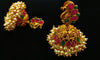 E0836_Gorgeous golden jumkas with peacock design studded with ruby stones with a bunch of bead drops.